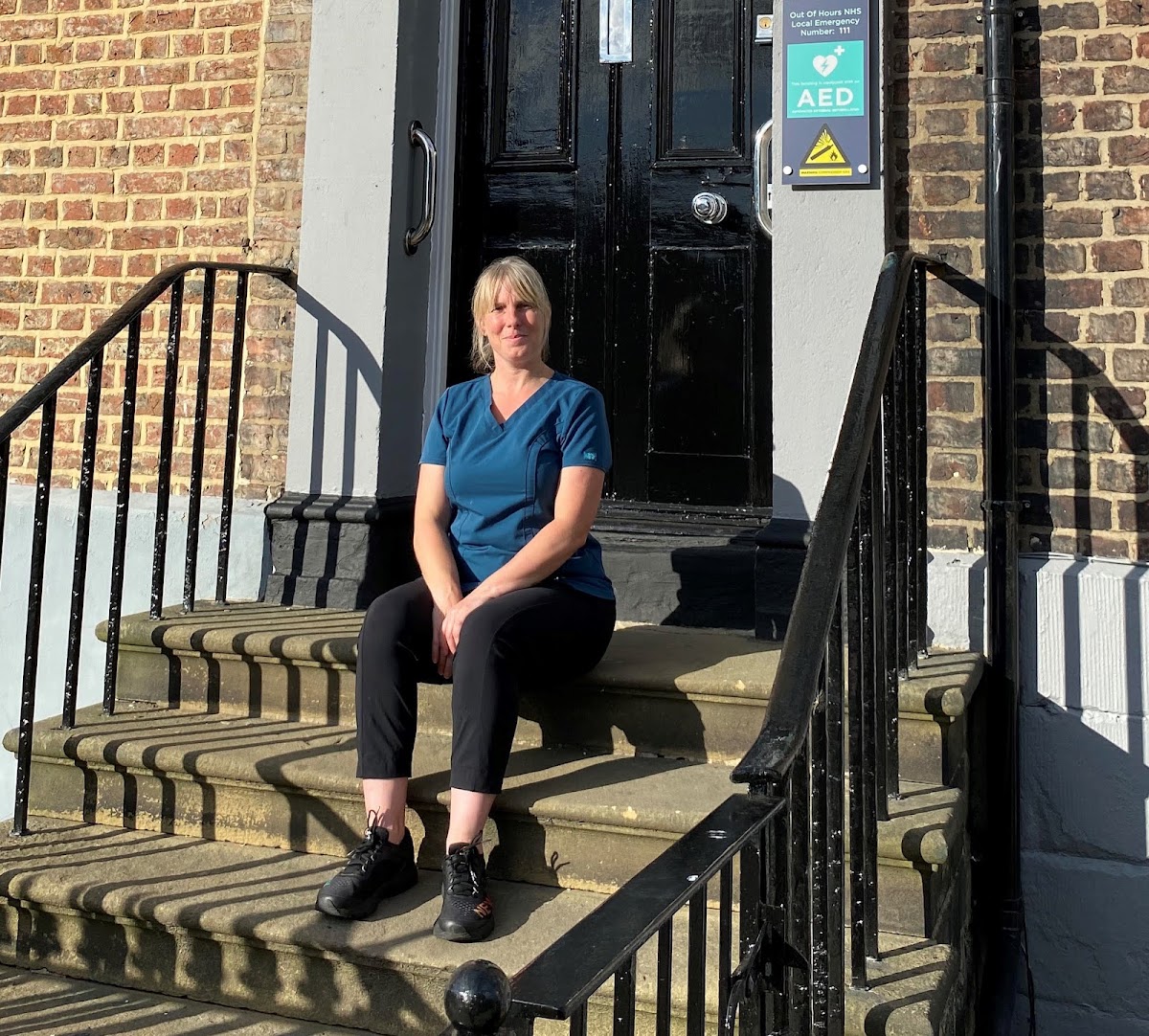 Jacqui Mewburn on the steps of the JM Podiatry clinic at Northumberland Square, North Shields